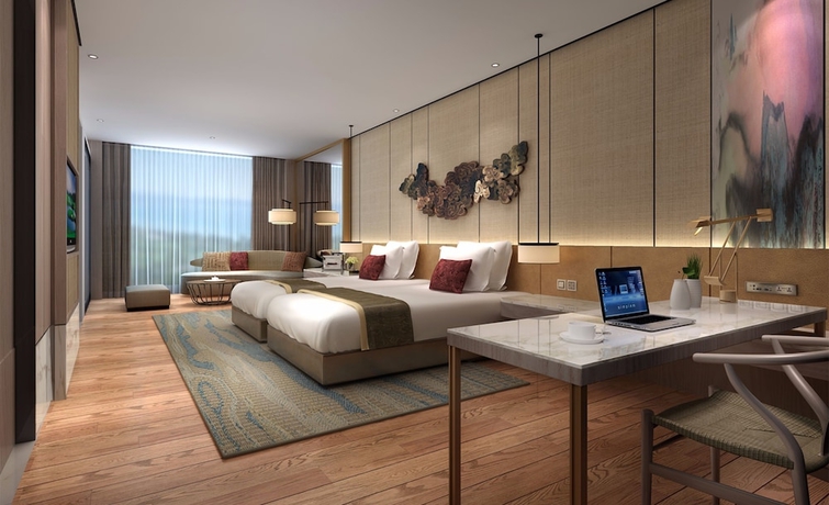 Imagen de la habitación del Hotel Sanya Shuang Da International. Foto 18