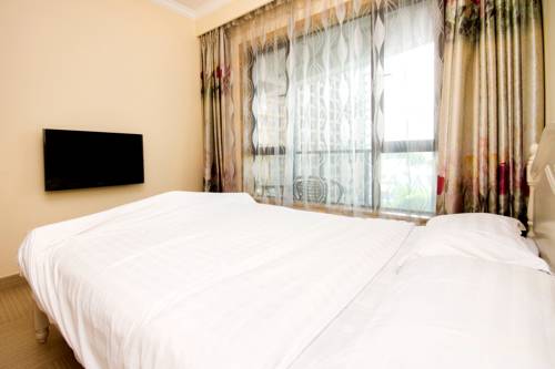 Imagen de la habitación del Hotel Sanya Wen Xin Hai Jing Apartement. Foto 6