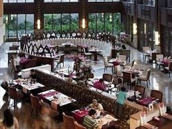 Imagen del bar/restaurante del Hotel Sanya Yalong Bay Villas Spa. Foto 2