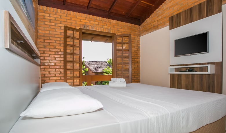 Imagen de la habitación del Hotel Sao Sebastiao Da Praia. Foto 4