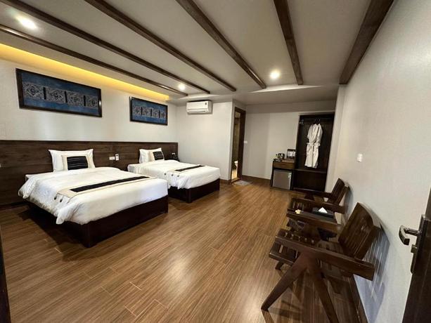 Imagen de la habitación del Hotel Sapa Pine Hill Ecolodge. Foto 11