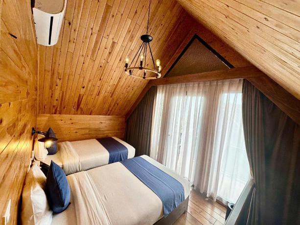 Imagen de la habitación del Hotel Sapa Pine Hill Ecolodge. Foto 19