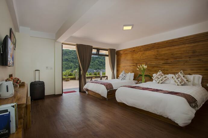 Imagen de la habitación del Hotel Sapa Village. Foto 17