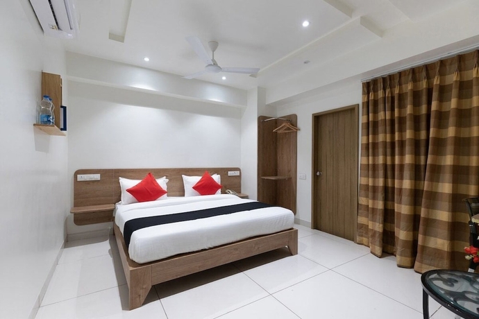 Imagen de la habitación del Hotel Sapphero Akshar Inn- Jamnagar. Foto 6