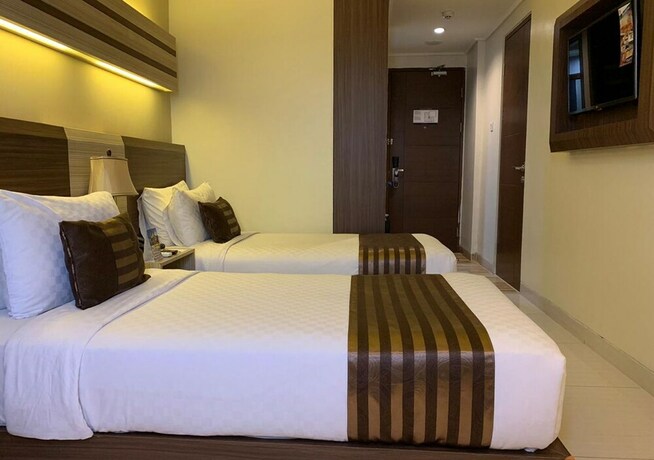 Imagen de la habitación del Hotel Sapphire Sky. Foto 24