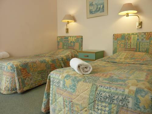 Imagen de la habitación del Hotel Sapphire Waters Motor Inn. Foto 2