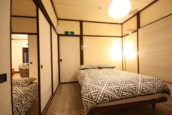 Imagen de la habitación del Hotel Sapporo Dome Front House. Foto 19