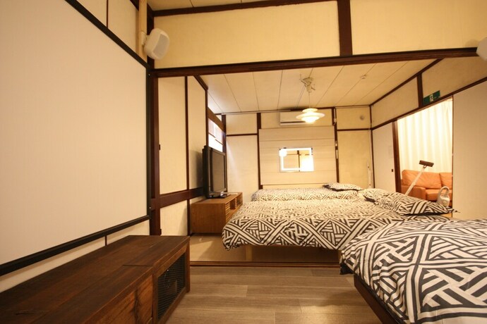 Imagen de la habitación del Hotel Sapporo Dome Front House. Foto 21