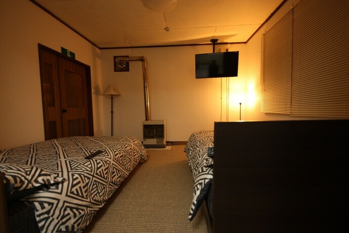 Imagen de la habitación del Hotel Sapporo Dome Front House. Foto 31