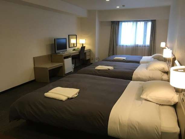 Imagen de la habitación del Hotel Sapporo Oriental. Foto 14