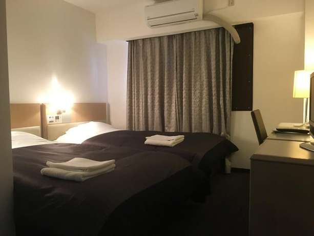 Imagen de la habitación del Hotel Sapporo Oriental. Foto 17
