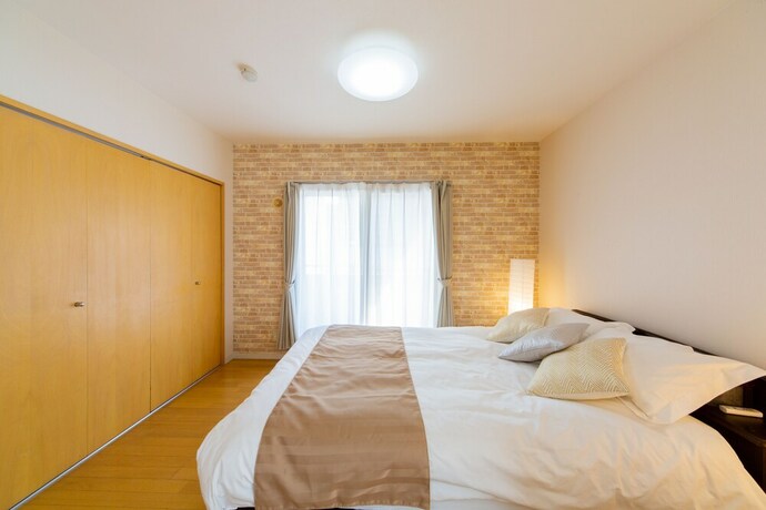 Imagen de la habitación del Hotel Sapporo Residential Juno. Foto 18