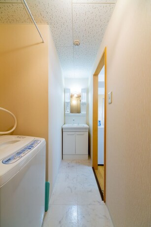 Imagen de la habitación del Hotel Sapporo Residential Juno. Foto 38