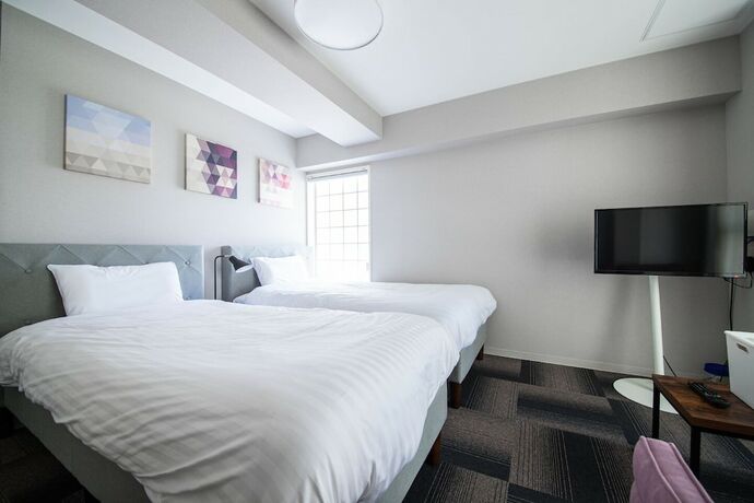 Imagen de la habitación del Hotel Sapporo Stay Nakajima Park. Foto 13