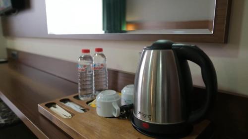 Imagen de la habitación del Hotel Sapran Deluxe. Foto 20