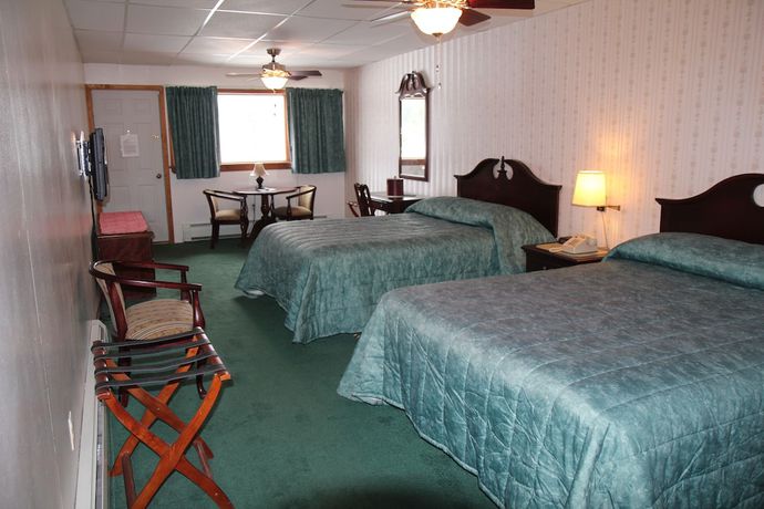 Imagen de la habitación del Hotel Sara Placid Inn and Suites. Foto 2