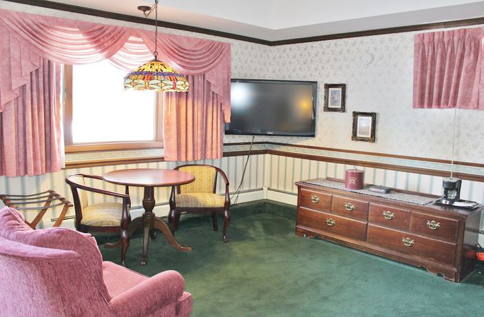 Imagen de la habitación del Hotel Sara Placid Inn and Suites. Foto 3