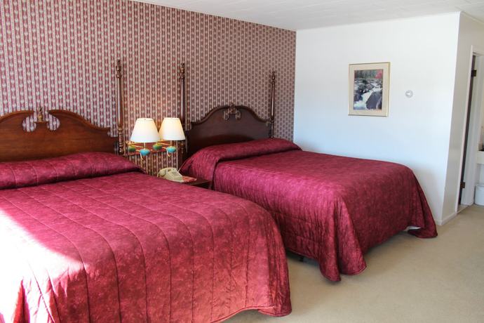 Imagen de la habitación del Hotel Sara Placid Inn and Suites. Foto 5
