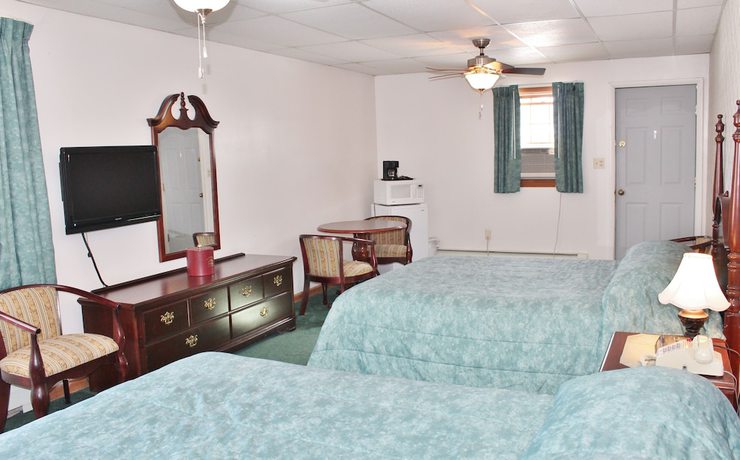 Imagen de la habitación del Hotel Sara Placid Inn and Suites. Foto 7