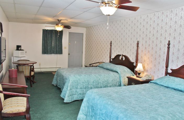Imagen de la habitación del Hotel Sara Placid Inn and Suites. Foto 8