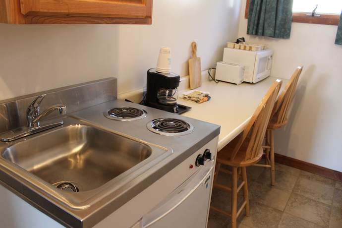 Imagen de la habitación del Hotel Sara Placid Inn and Suites. Foto 9