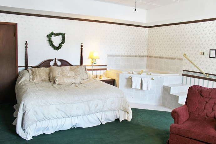 Imagen de la habitación del Hotel Sara Placid Inn and Suites. Foto 10