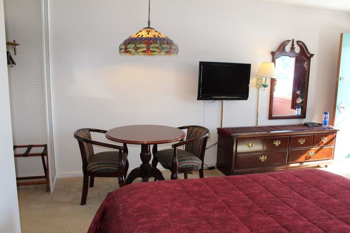 Imagen de la habitación del Hotel Sara Placid Inn and Suites. Foto 12