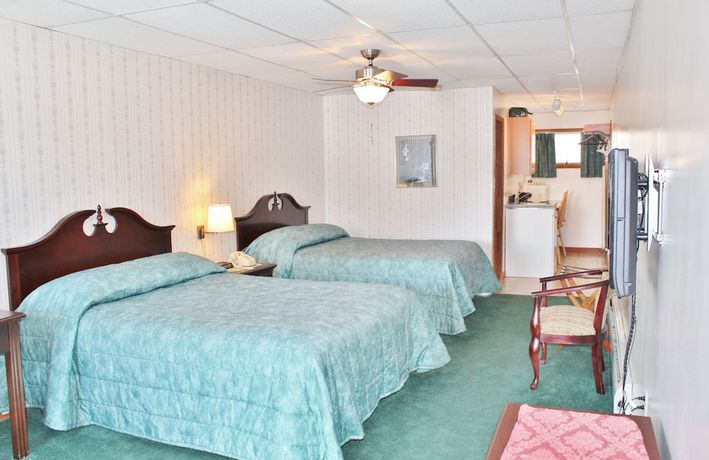 Imagen de la habitación del Hotel Sara Placid Inn and Suites. Foto 15