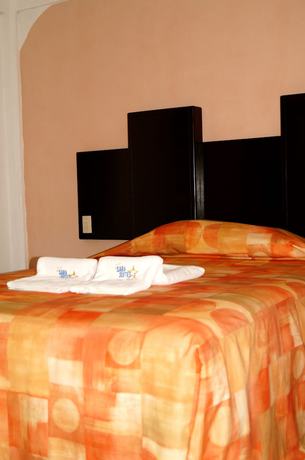 Imagen de la habitación del Hotel Sara Suites Ixtapa. Foto 12