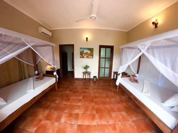 Imagen de la habitación del Hotel Sarabi Zanzibar. Foto 12