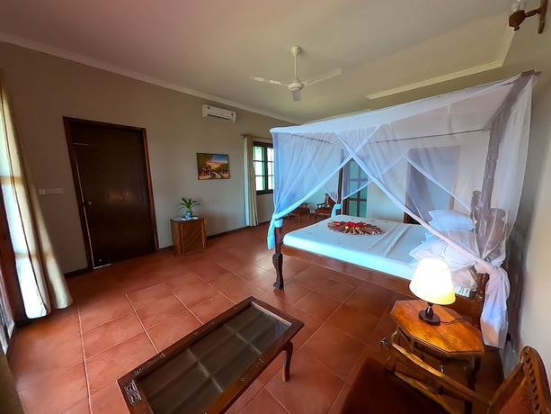 Imagen de la habitación del Hotel Sarabi Zanzibar. Foto 13