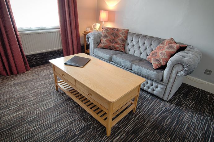 Imagen de la habitación del Hotel Saracens Head. Foto 12