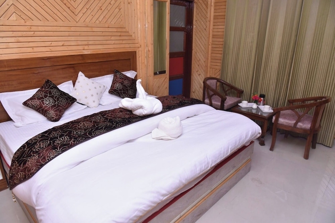 Imagen de la habitación del Hotel Sarahan Holliday Inn. Foto 1