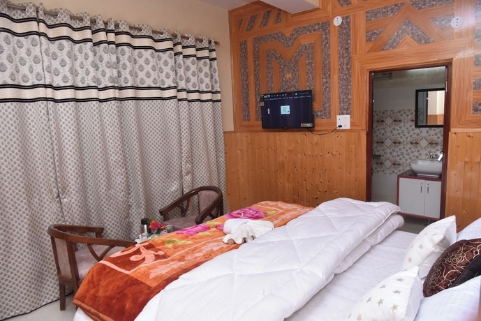 Imagen de la habitación del Hotel Sarahan Holliday Inn. Foto 5