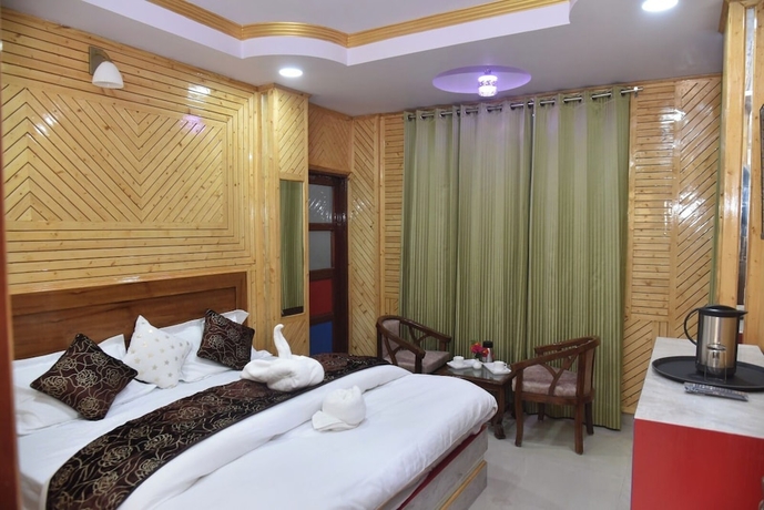 Imagen de la habitación del Hotel Sarahan Holliday Inn. Foto 8