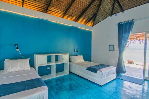Imagen de la habitación del Hotel Sarana Bungalows. Foto 9