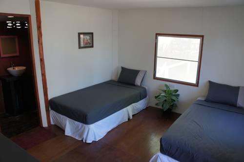 Imagen de la habitación del Hotel Sarana Bungalows. Foto 14