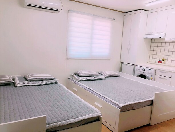 Imagen de la habitación del Hotel Sarang Guesthouse Dongdaemun. Foto 16