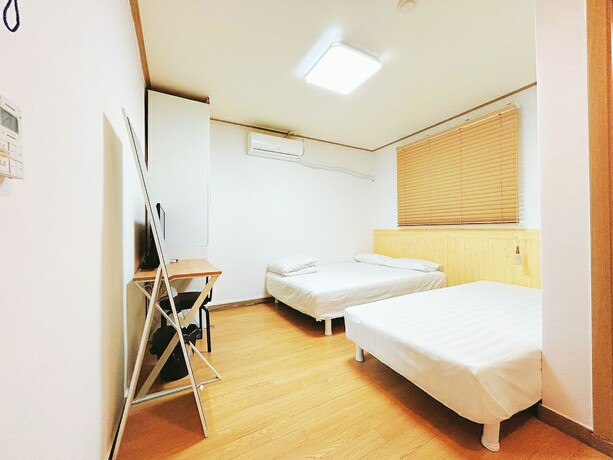 Imagen de la habitación del Hotel Sarang Guesthouse Dongdaemun. Foto 19
