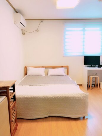 Imagen de la habitación del Hotel Sarang Guesthouse Dongdaemun. Foto 24