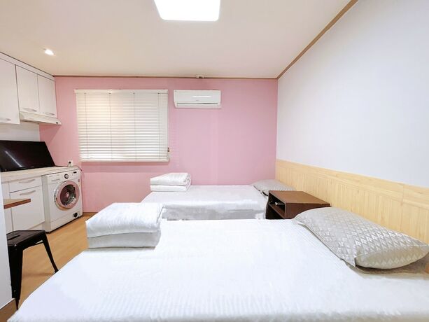 Imagen de la habitación del Hotel Sarang Guesthouse Dongdaemun. Foto 28
