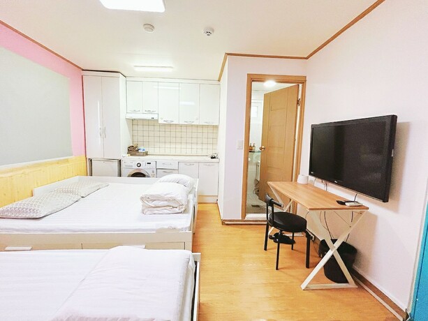 Imagen de la habitación del Hotel Sarang Guesthouse Dongdaemun. Foto 32