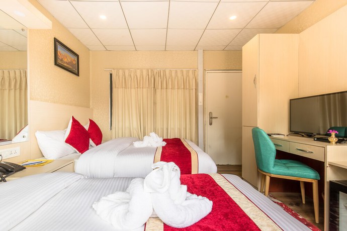 Imagen de la habitación del Hotel Sarathi. Foto 11