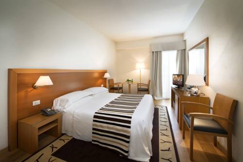 Imagen de la habitación del Hotel Sardegna , Suites and Restaurant. Foto 15