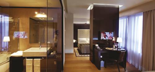 Imagen de la habitación del Hotel Sardegna , Suites and Restaurant. Foto 16