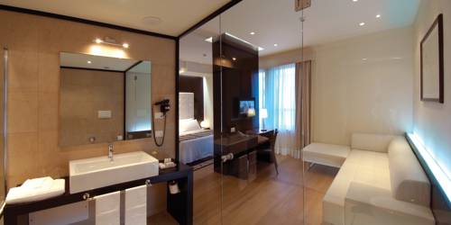 Imagen de la habitación del Hotel Sardegna , Suites and Restaurant. Foto 17