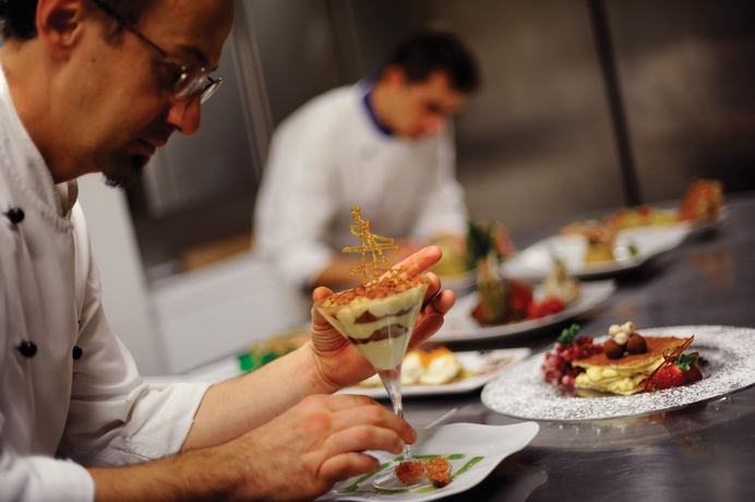 Imagen de la habitación del Hotel Sardegna , Suites and Restaurant. Foto 19
