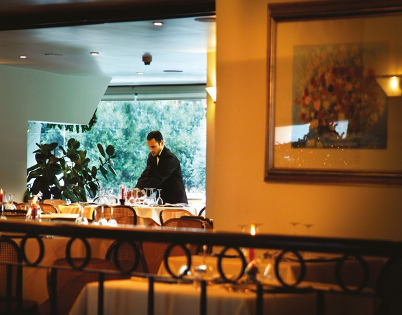 Imagen del bar/restaurante del Hotel Sardegna , Suites and Restaurant. Foto 10