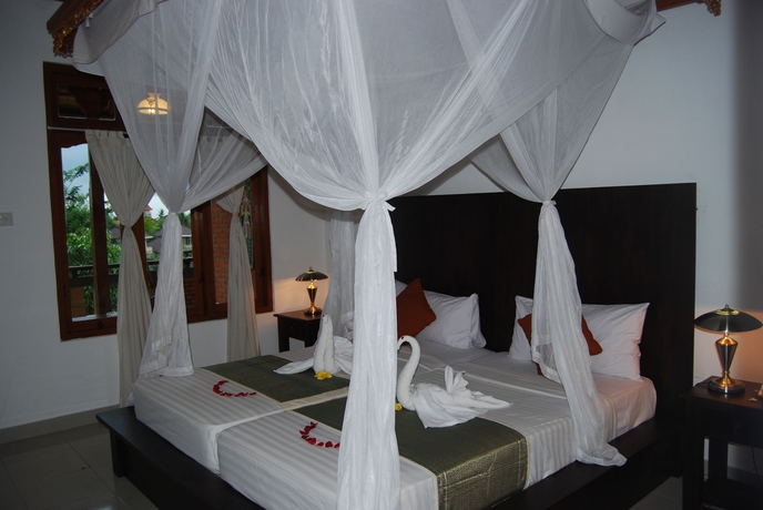 Imagen de la habitación del Hotel Saren Indah. Foto 15