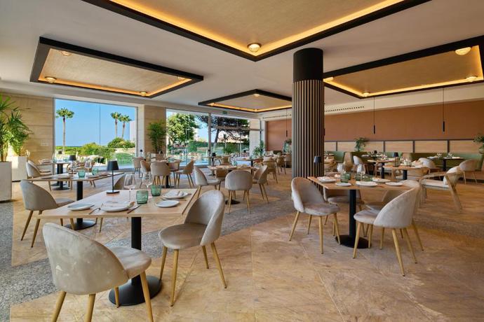 Imagen del bar/restaurante del Hotel Sarena de Muro Resort Mallorca, part of Destination by Hyatt. Foto 8